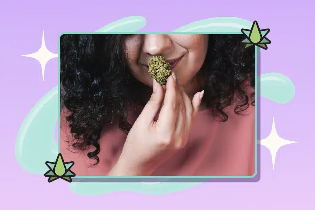 A woman is smelling a cannabis bud