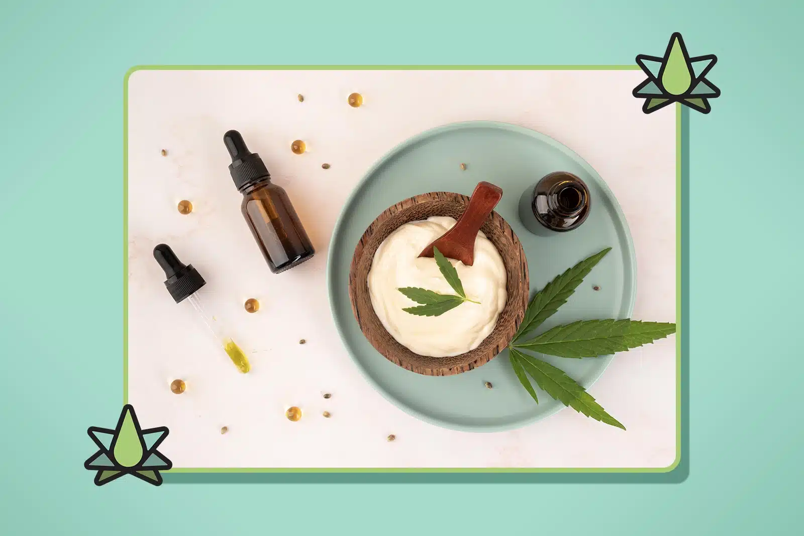 White cream in a coconut bowl on a plate with cannabis leaves, accompanied by two tincture bottles, a dropper, and a few scattered drops of yellow oil